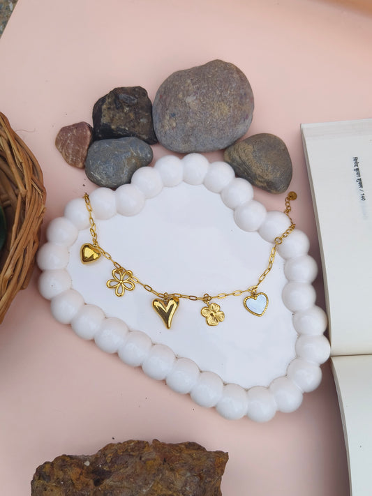 Golden Charm Bracelet – Heart & Flower Motifs