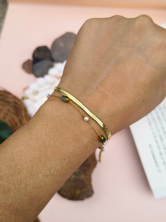 Elegant Gold Bracelet with Green Stone Accents