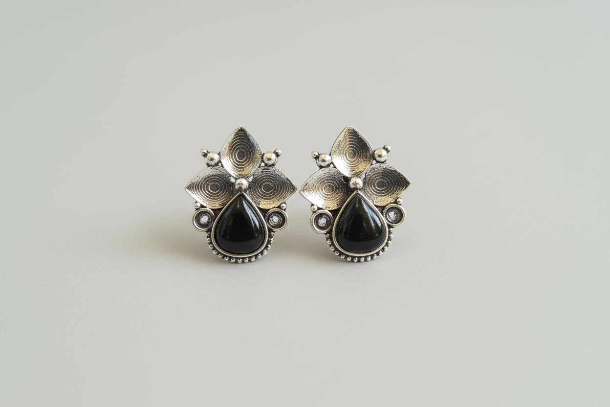 RAATRANI"Oxidised Silver Floral Stud Earrings with Black Stone – Ethnic Statement Jewellery"
