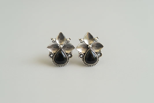 RAATRANI"Oxidised Silver Floral Stud Earrings with Black Stone – Ethnic Statement Jewellery"
