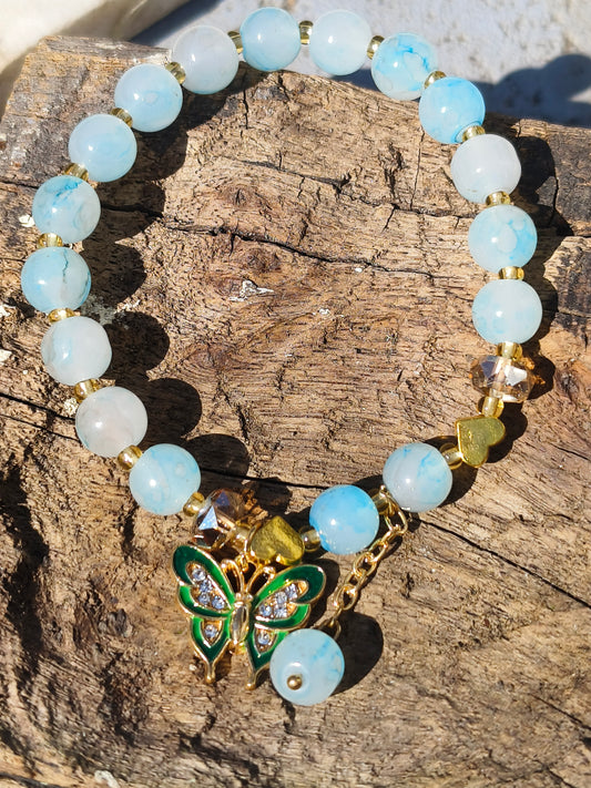 Sky Blue Beaded Bracelet with Green Butterfly Charm