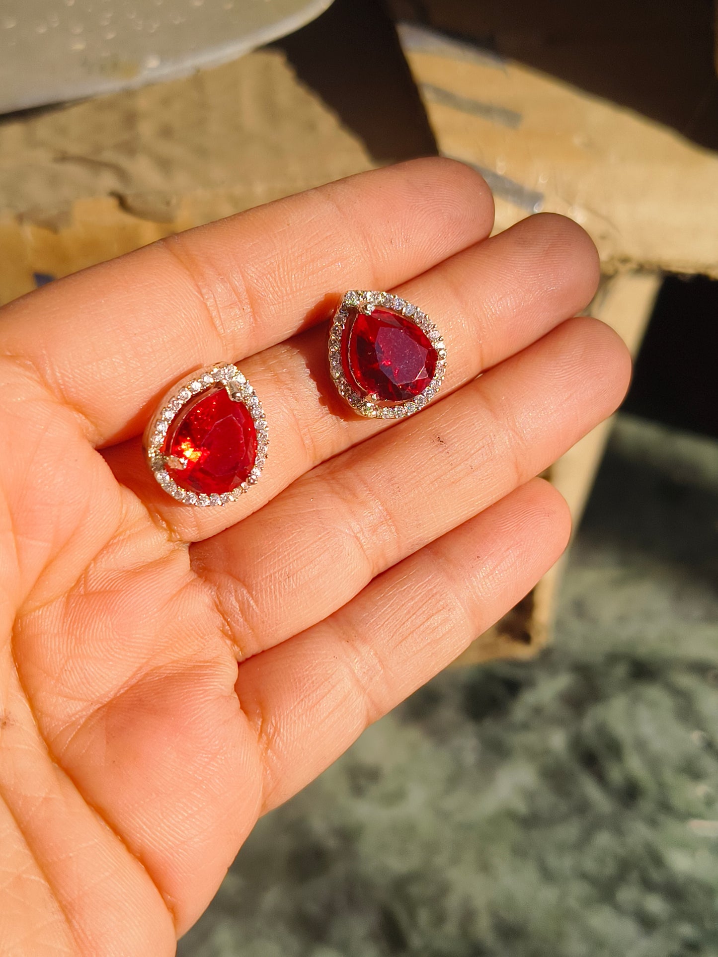 Anti Tarnish Silver Red Teardrop Stud Earrings for Women | AD Border Ruby Look Earrings