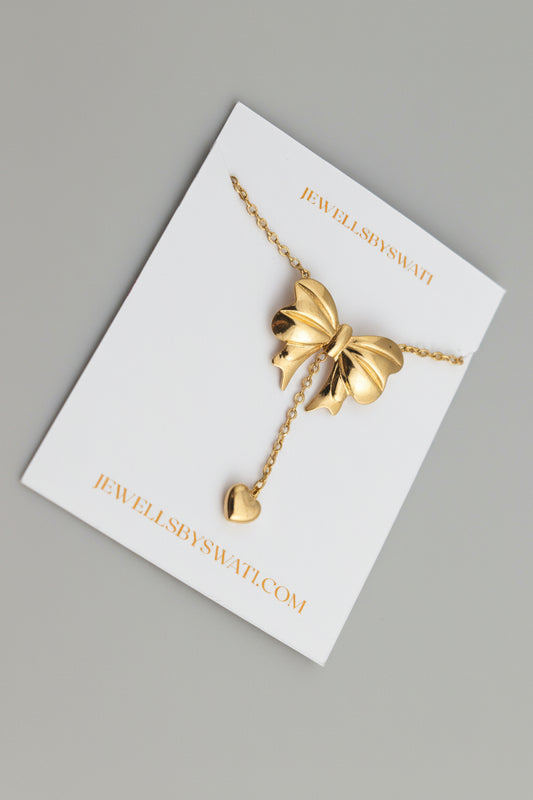 Gold Bow Pendant Necklace with Heart Drop | Cute Feminine Statement Chain
