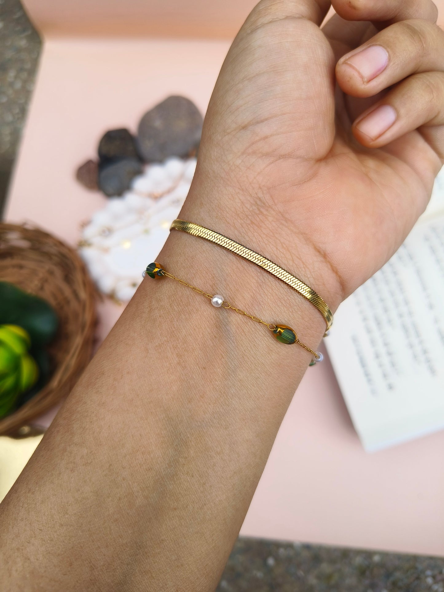 Elegant Gold Bracelet with Green Stone Accents