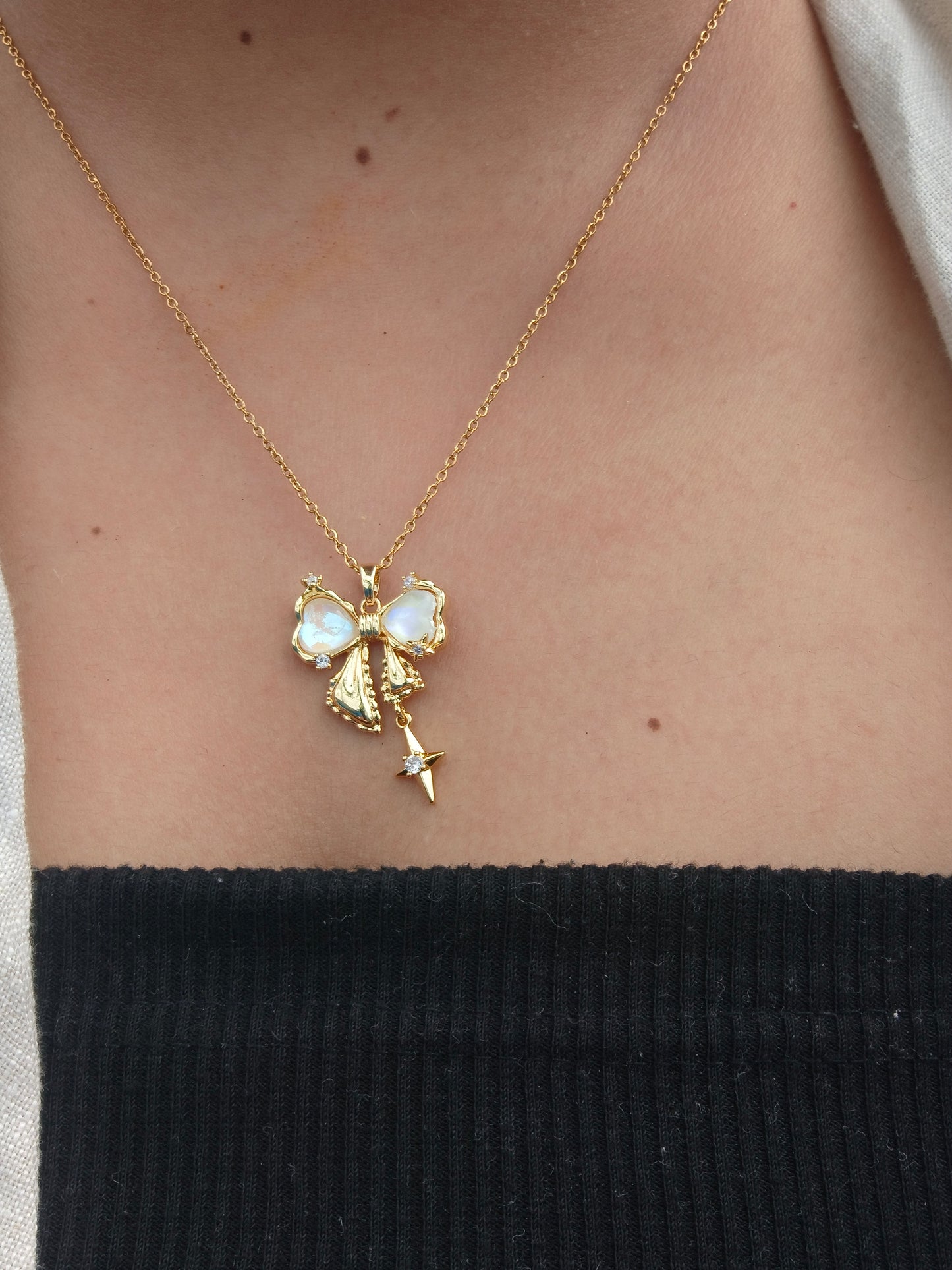 Stainless Steel Bow Pendant Necklace with Star Charm