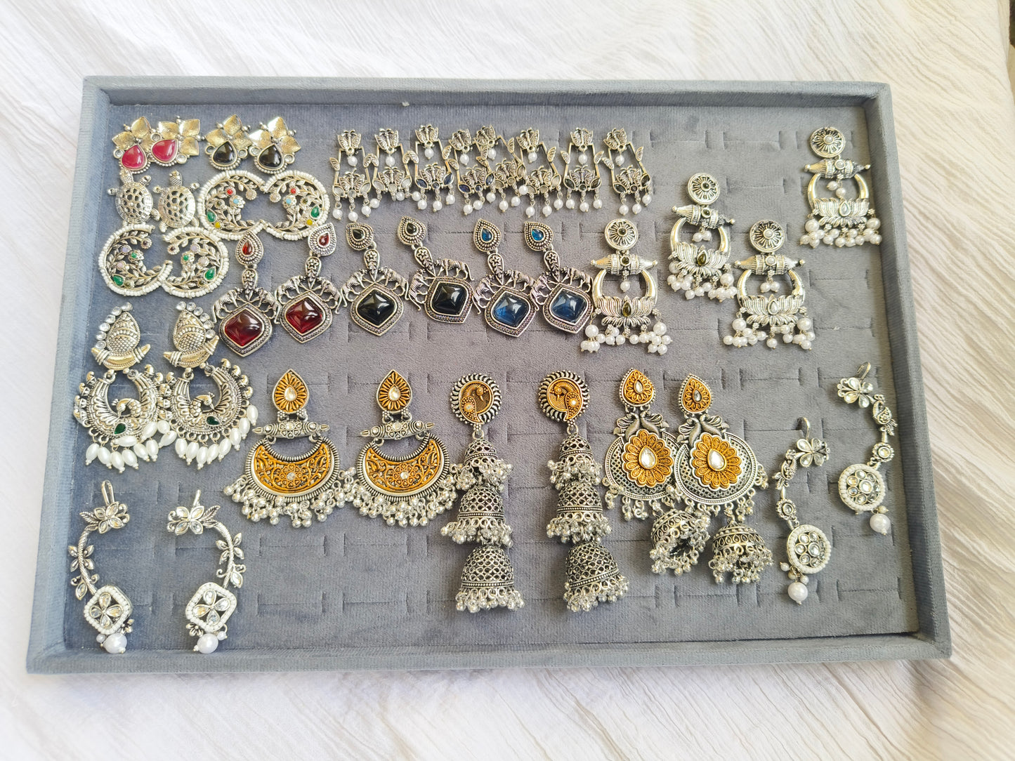 RAATRANI"Oxidised Silver Floral Stud Earrings with Black Stone – Ethnic Statement Jewellery"