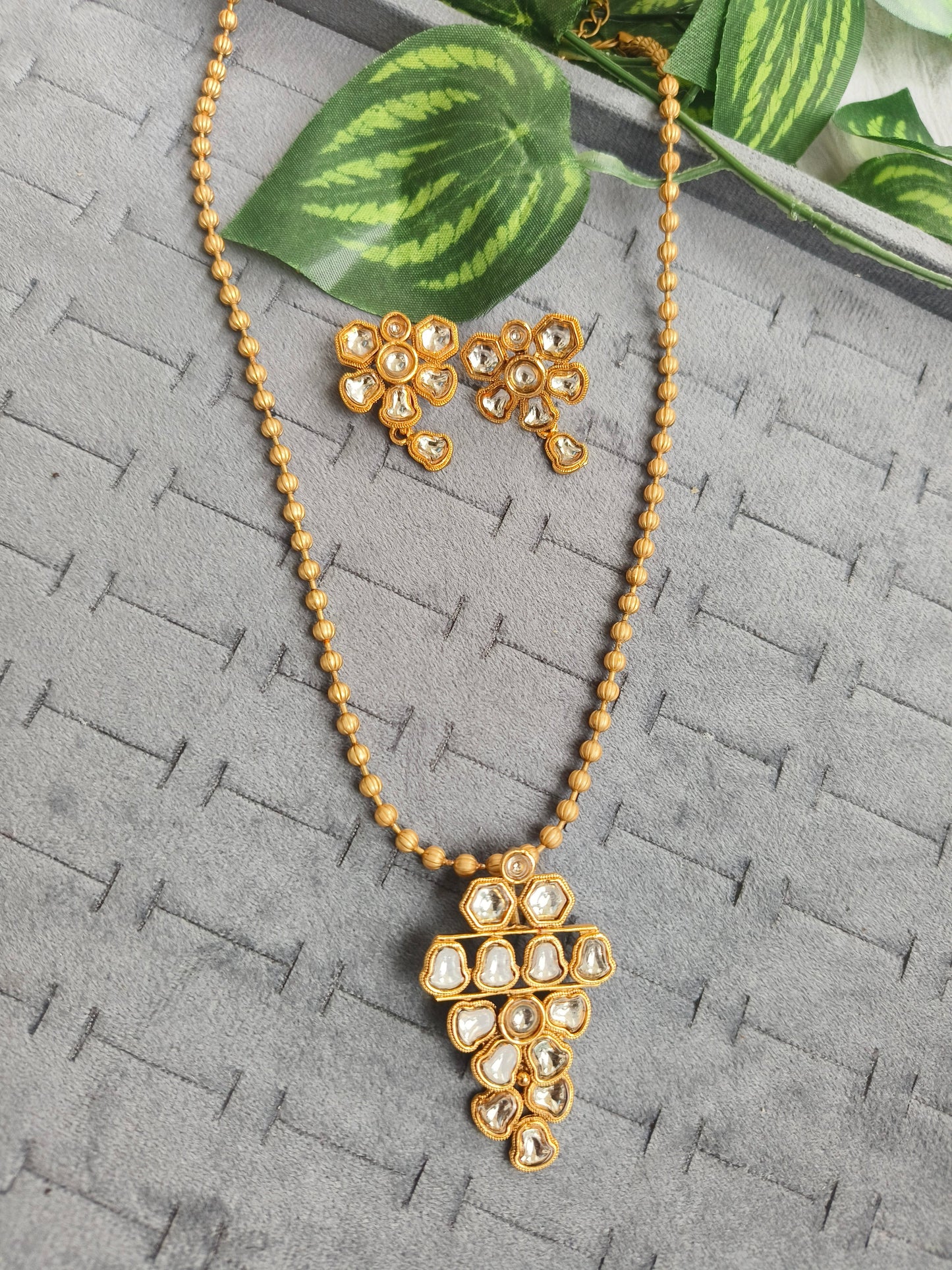 Elegant Kundan-Inspired American Diamond Gold Neck Set with Matching Earrings