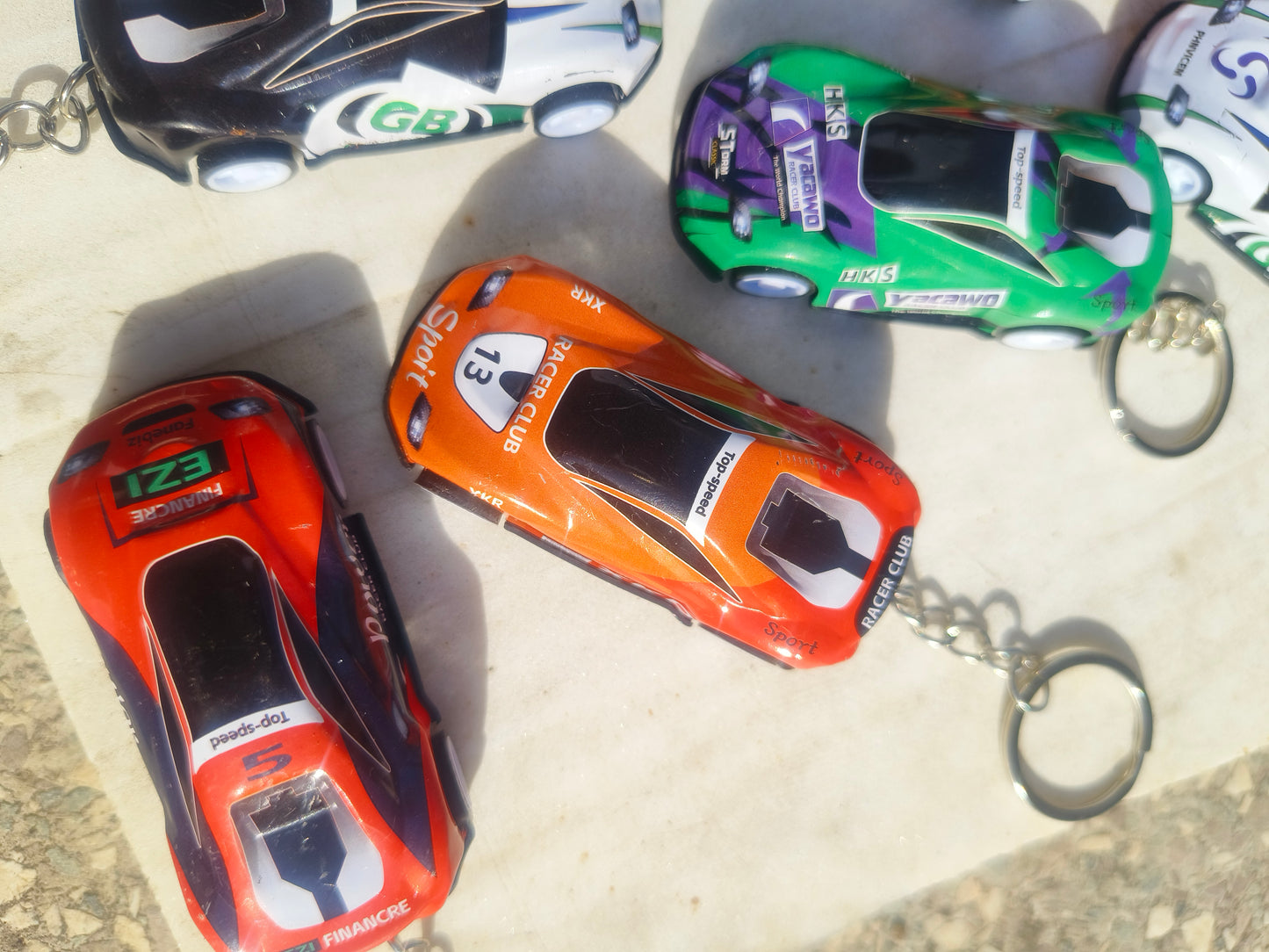 Automatic Racing Car Keychain | Colorful Mini Car Keyring (Random Design)