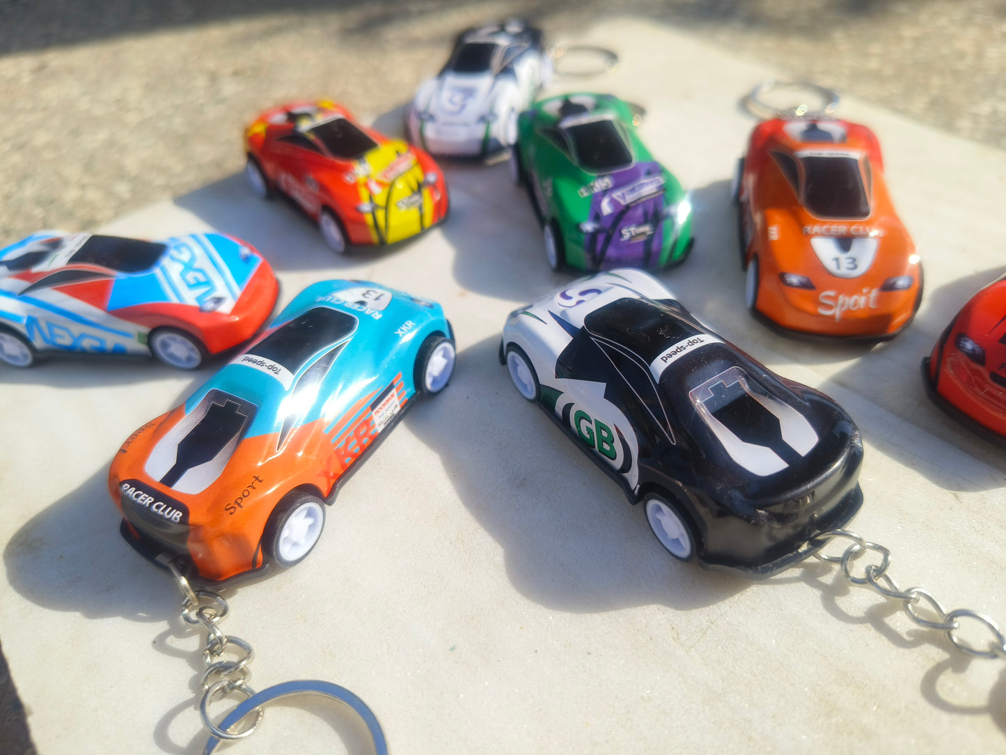 Automatic Racing Car Keychain | Colorful Mini Car Keyring (Random Design)