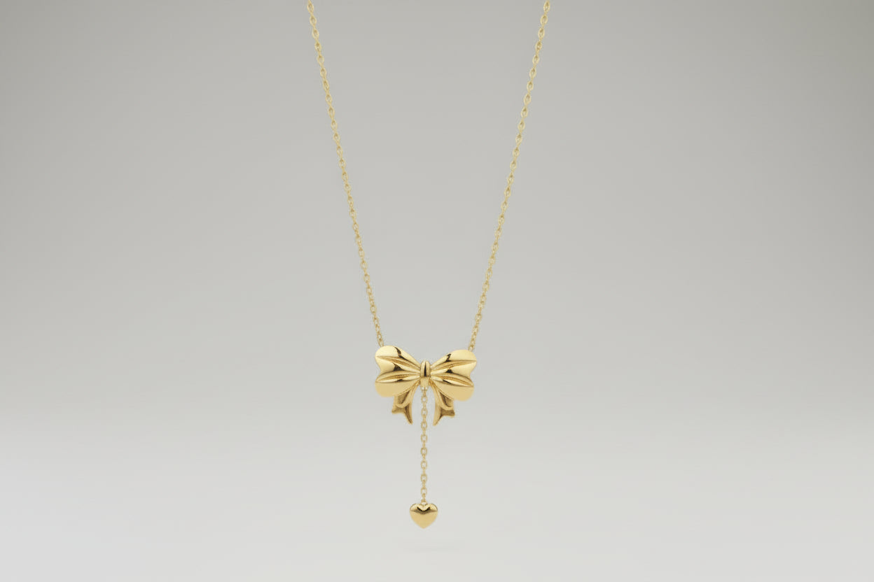 Gold Bow Pendant Necklace with Heart Drop | Cute Feminine Statement Chain